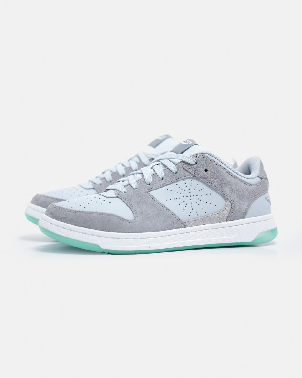 Pair of gray Unitus Immanuel 1 sneakers shown at a three-quarter angle.