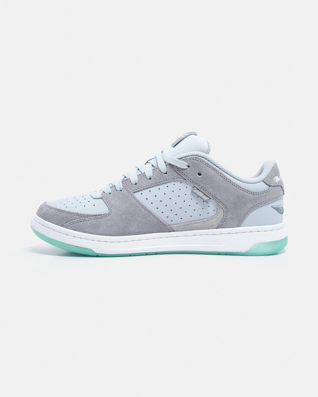Gray Unitus Immanuel 1 sneaker in lateral profile with scripture tag visible.