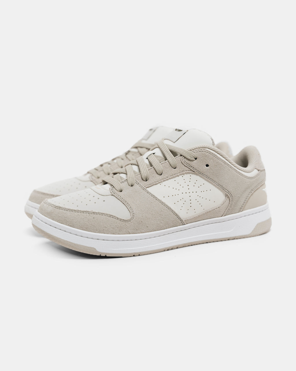 Pair of Immanuel 1 Tan sneakers, three-quarter view, with the perforated cross on the outer side
