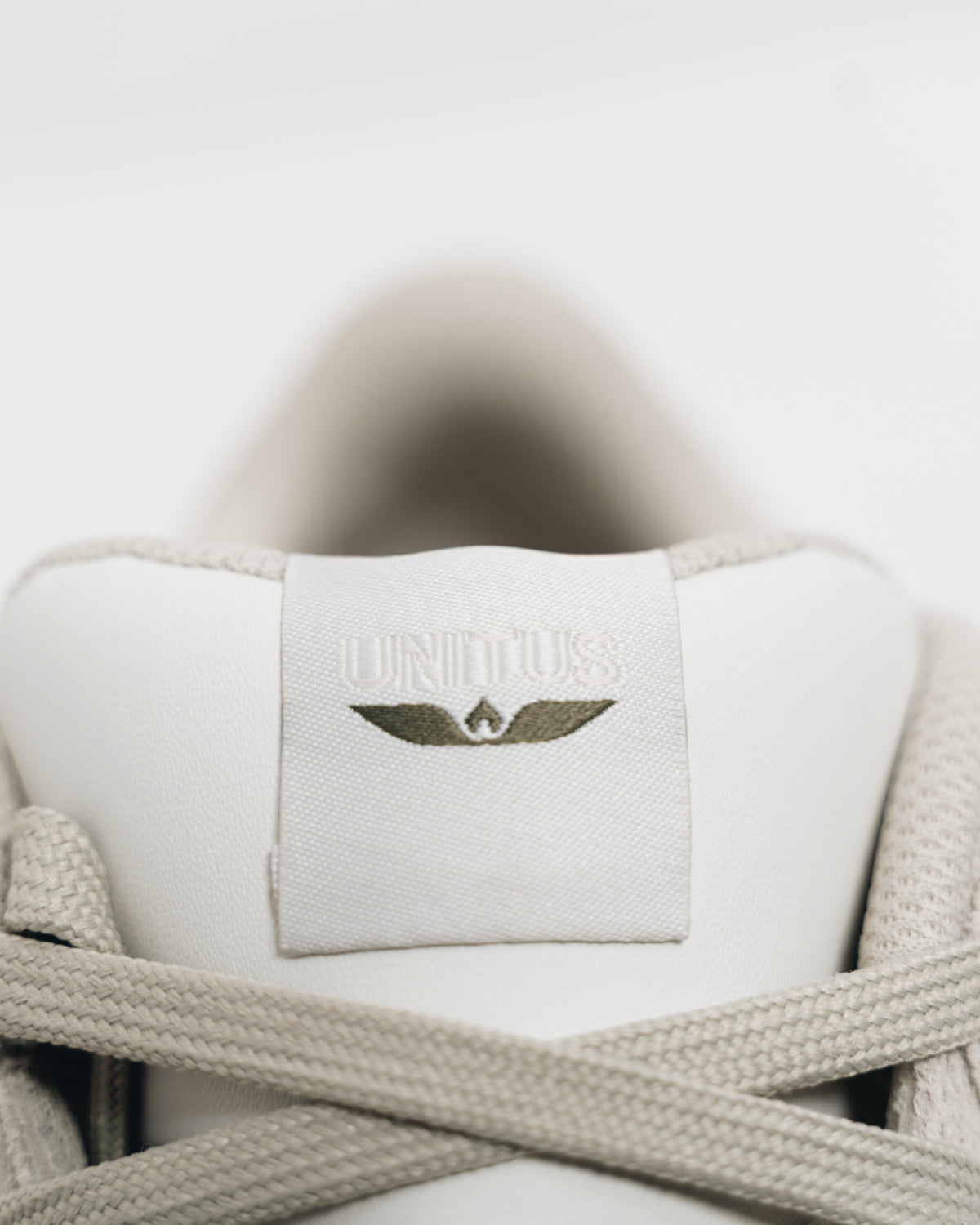Woven Unitus tongue label with wing logo on the Immanuel 1 Tan